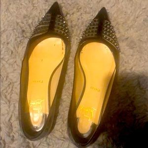 Christian Louboutin flats with silver spike detail